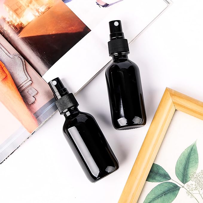2oz Glass Spray Bottle, Fine Mist Boston Glass Bottles with Black Fine Mist Sprayer Small Clear Bottles for Essential Oils, Bath, Beauty, Hair & Cleaning, UV Black, Pack of 24
