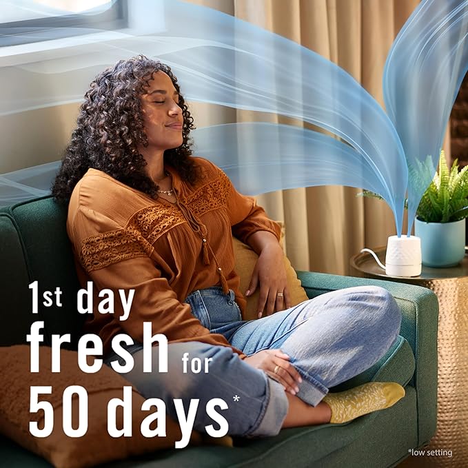 Febreze Plug Scent Booster Starter Kit, Oil Diffuser, Air Freshener Plug in, Continuous Scent Device + 2 Downy Calm Refills